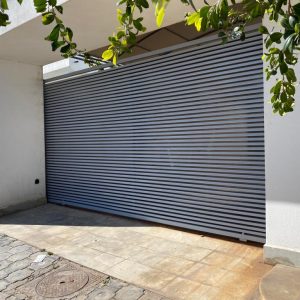 Porte coulissante et battante